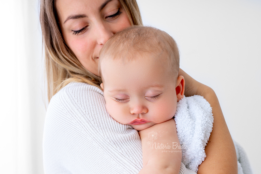 asleep baby with mummy